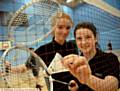 BIG SMILES . . . Failsworth School pair Rebecca Walley (aged 13, left) and Beth Lloyd (13) get ready for some exciting badminton action