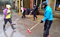 Volunteers from Oldham help clear out some of the homes badly hit by the floods