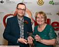 SO SHOCKED . . . Freeman Meacher Ambassador Award winner Mick Harwood, with presenter Jean Stretton, leader of Oldham Council.