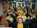 FIRBANK School's Out before and after-school club celebrate an outstanding Ofsted rating; (front) Keira Hopwood (7) leads the cheers