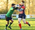 ALEX Jobson tries to fend off a Fleetwood tackle.