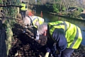 BACK breaking . . . volunteers tidy up the towpath
