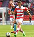 LEADING LIGHT . . . Doncaster Rovers' Tommy Rowe started his career at Stockport