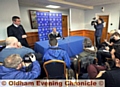 FACING THE PRESS . . . Neil Joy (left, standing) and returning Athletic manager John Sheridan.