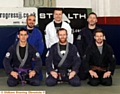 HEADING FOR PORTUGAL . . . Stealth Brazilian Jiu-Jitsu Club members, from left to right, back: Roberto Mura, Peter Wilson, Phil Russell. Front: Nemil Malczewski, Steve Campbell, Jake Corrigan.