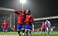 GET IN: Freddie Ladapo celebrates his 49th-minute strike with penalty hero Lee Croft