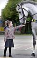 Lola Slack (5) meets Maxwell the police horse. 