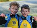 WELL DONE . . . Cole Earley (left, Hulme) won the boys' Years Three and Four race. School-mate Harrison Byrom (right) finished in second place