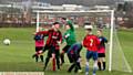 CLOSE . . . a Church corner-kick is cleared by the Britannia goalkeeper