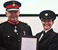 The Lord-Lieutenant of Greater Manchester Mr. Warren J. Smith presents certificate to Jenna Cahill 