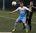 BACK OFF . . . Heyside's Mark Hopwood shields the ball from an Atherton opponent