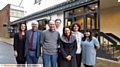 OUTSIDE Oldham Coliseum Theatre with MP Debbie Abrahams are (l-r) Carly Henderson, the theatre’s head of learning and engagement, executive director David Martin, artistic director Kevin Shaw and James Butler, Alex Tigo and Ammerun Nessa, members of the teaching theatre