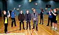 HAVING a ball . . . the handball team practice over the heads of Anthony Crolla, Paul Scholes and Barrie McDermott