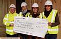 PRESENTATION of cheque for £2,200 to Maggie's Oldham by runner Sharon Livesey. From left, Wayne Sutherland (site manager), Jo Taylor (centre visitor), Laura Tomlinson (fundraising manager), Sharon Livesey