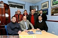 WELCOME TO THE FOLD . . . Oldham RL chairman Chris Hamilton (back row, centre) and some of his match-day staff are pictured with Stalybridge Celtic FC directors Ian Milligan (front, left), Syd White and Gordon Greenwood.