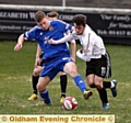 SEEL PARK TUSSLE . . . match-winner Tom Pratt (right) tangles during Mossley’s 2-1 victory against Ossett Town. PICTURE by TIM BRADLEY.