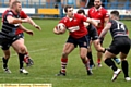 WATCH OUT . . . Oldham’s Phil Joy looks for a gap against the Broncos.