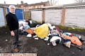 COUNCILLOR Warren Bates with the dumped rubbish