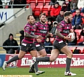 TAKING UP THE ATTACK: Oldham prop Jack Spencer embarks on a forward run at Leigh.