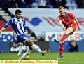 NOT THIS TIME . . . Latics’ Carl Winchester takes a strike at goal.