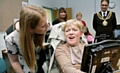 ACE visit: Ashton MP Angela Rayner and the Mayor and Mayoress of Oldham,councillors Ateeque Ur-Rehman and Yasmin Toor, meet Nicola Bush. Nicola has cerebral palsy and communicates using a voice output communication aid that she operates via head tracker.