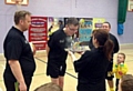 Chris Jones blows out the candles on his cake celebrating his 21st birthday and gaining his coaching award