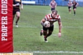 TOUCH DOWN . . . Danny Langtree dives in underneath the posts
