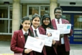 FOUR of the successful Oldham West candidates . . . Hathershaw pupils (from left) Natasha Ateeque, Jasmine Raza, Khadija Ali and Tomi Akingbehin