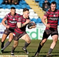 OLDHAM try-scorer Richard Lepori looks for a gap in the Featherstone line.