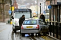 POLICE arrive to deal with the car, which had mounted the kerb and collided with the railings on Union Street
