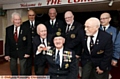 WELL done . . . Ernie (centre) with his Oldham Royal Naval Association comrades (from left) Eddie Smith, David Browne, Harry Oakley, Vinnie Gartside, chairman Matt Gilmore, Pongo Gordon and Ricky Smith
