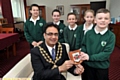 GIFT for afar: the Mayor presents Limehurst pupils, from left to right, Alishyah Warburton, Bethany Ledger, Leon Rostron, Elizabeth Crofts and Kayson Flanagan, with a plaque to take on their travels to China