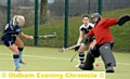 STICKS AWAY . . . Oldham’s Karen Rowley unleashes an effort towards the Prescot goal. PICTURE: TIM BRADLEY