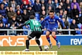 EYE ON THE BALL . . . Aaron Amadi-Holloway takes on Rochdale’s Niall Canavan. Loan forward relishing his Latics lease of life