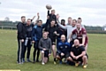 Centre stage . . . Riley Parrish on his dad’s shoulders, alongside players from Saddleworth Rangers Rugby League team