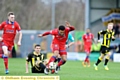 AARON Amari-Holloway battles for the ball at Burton Albion.