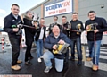 Manager Alan Nield (front), with Screwfix's Wayne Harwood, left, DJ Clint boon, chef Simon Wood, the Mayor, Barry Feegan from Oldham College, rugby star Barrie McDermott and Mark Young, assistant manager at Screwfix.