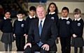 Bare Trees headteacher John Tobin with (l-r) pupils Nayyira Malik, Haris Kayani, Abdul Habib, Suhana Begum, Abdul Qabid and Emillie Davies.