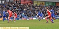 WHISTLED WIDE: Matt Palmer (centre) lets fly against Chesterfield and narrowly fails to hit the target.