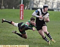 Waterhead’s Patrick Toft (left) attempts to catch Ethan Langhorn, of Saddleworth Rangers. 