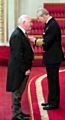 BOB HOLT receives the OBE from Prince Charles