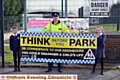 SAFETY message . . . Charlotte Rigby and William Cousins with PCSO Wayne Turley and the new banner at St Anne’s Lydgate.