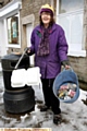 Volunteer Gillian Clark managed to pick up some litter in Delph village, wearing her royal paper grown