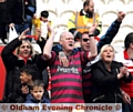 COME ON OLDHAM: fans celebrate the victory over Hull KR