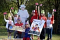 Rushcroft Primary School children, staff and parents celebrate the Queen's 90th birthday. Left to right, Abigail Jones, Jessica Baxter, Hannah Vesnenko, Evan Howard-McMunn, Luke Rawson, Tristan Ross, Isabella Hart.