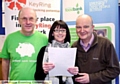 FUNDING boost: (from left) Gordon Roscoe, from CAP Oldham management committee; Claire Gleeson, North-West manager for Keyring; and Andrew Barr, Oldham Food Bank ,with the letter confirming funding