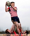 LIFT-OFF . . . Lewis North gets a helping hand from two Oldham team-mates as he catches the ball at a line-out.