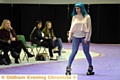 Rainy City Roller Derby fashion show as Natalie Goodwin glides on the runway.