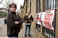 Dona and Graham Unsworth of Jack Essex from Mossley with a road safety campaign poster at Pennine Medical Centre, Mossley