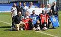 TEAM Ellis... footballing idols to clash at Boundary Park tonight to support Ellis Robinson (17), left paralysed after a football accident. Holding shirts are players ­— from left: Paul Scholes, John Mackin, Frank Sinclair and Mike Flynn 